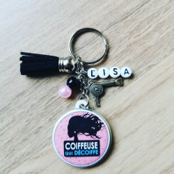 Porte clé coiffeuse qui...